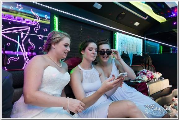 Happy customers enjoying luxury limousine service from www.logisticsflowhub.xyz during a memorable event.